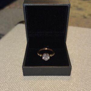 Elegant Gold Ring with Clear Stone